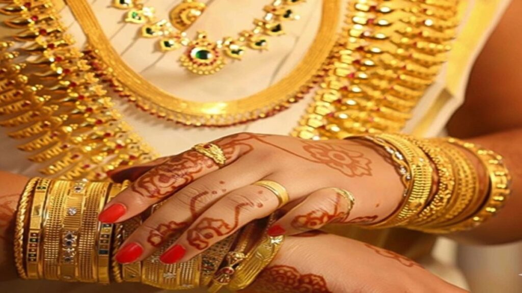 Gold jewellery displayed in a store reflecting rising gold prices